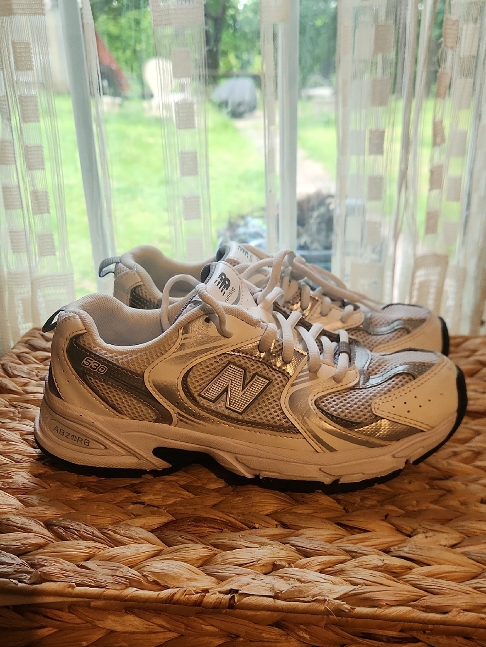 New Balance Silver and White Mesh Athletic Sneakers